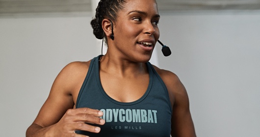 Instructor speaking into microphone